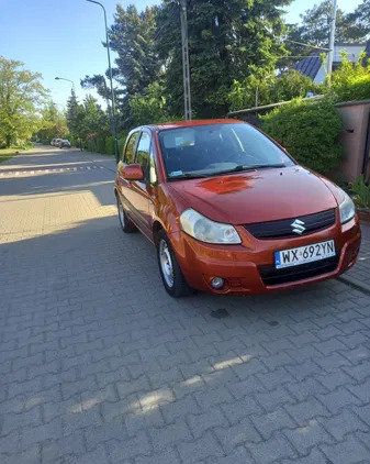 suzuki warmińsko-mazurskie Suzuki SX4 cena 10000 przebieg: 355000, rok produkcji 2007 z Warszawa